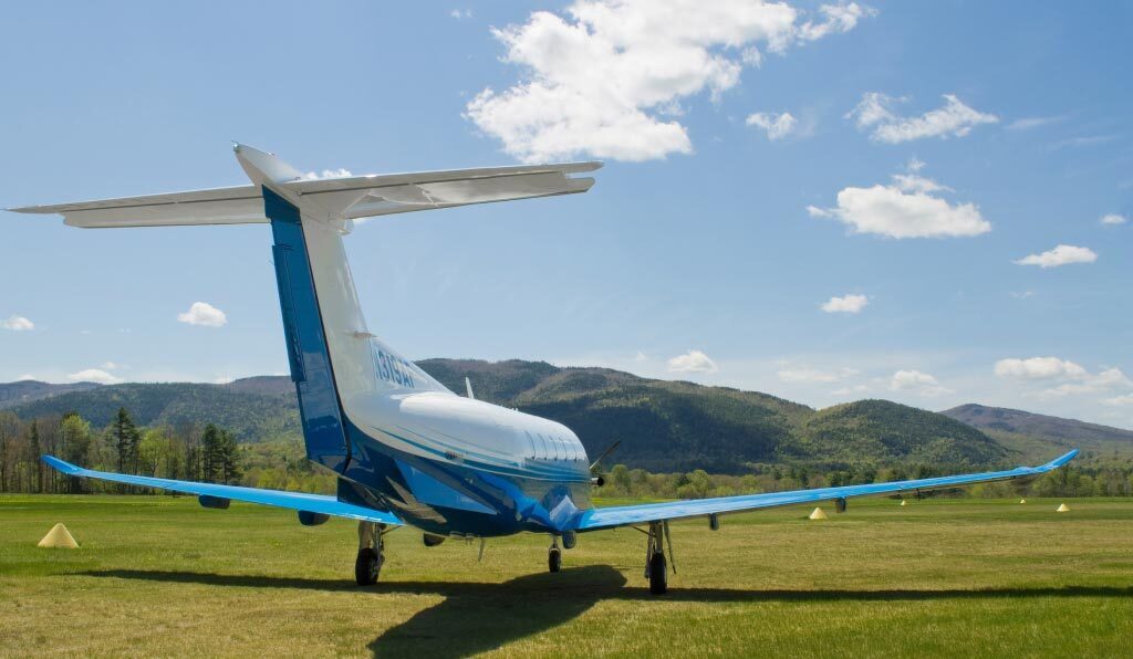 Pilatus PC-12 on a grass runway
